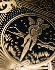 Bicycle Black and Gold Metalluxe - detalhe macro do querubim dourado